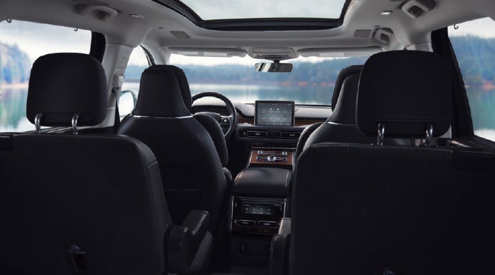 The interior of a 2024 Lincoln Aviator® SUV from behind the second row | Fair Oaks Lincoln in Naperville IL