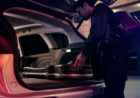 The driver of a 2024 Lincoln Corsair® SUV is shown selecting the drive mode. | Fair Oaks Lincoln in Naperville IL
