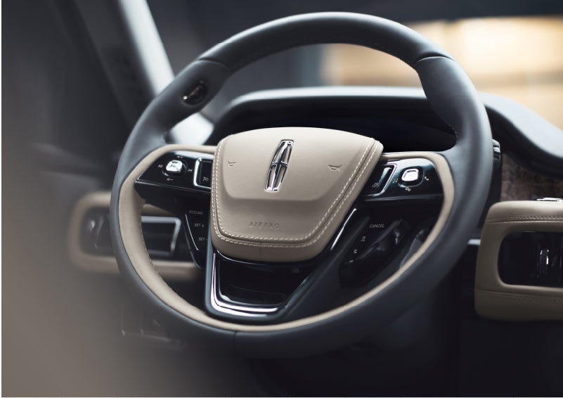 The intuitively placed controls of the steering wheel on a 2023 Lincoln Aviator® SUV | Fair Oaks Lincoln in Naperville IL