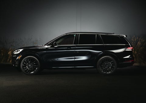 A 2024 Lincoln Aviator® SUV is shown in the Infinite Black exterior color | Fair Oaks Lincoln in Naperville IL