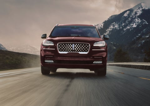 A 2024 Lincoln Aviator® SUV is shown in the Diamond Red exterior color. | Fair Oaks Lincoln in Naperville IL
