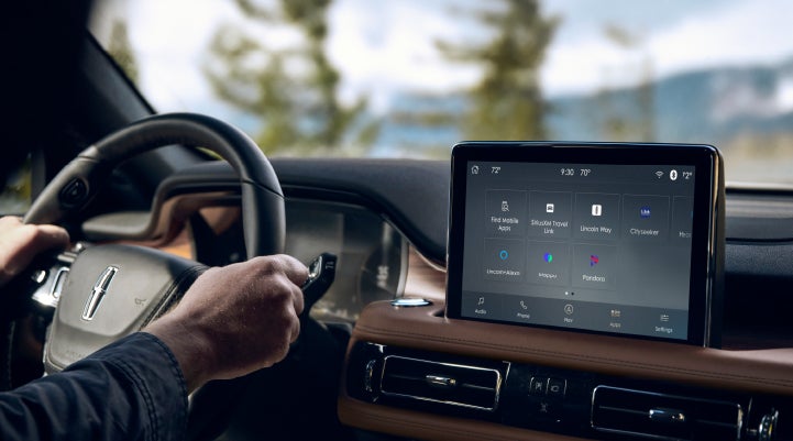 The center touchscreen of a Lincoln Aviator® SUV is shown | Fair Oaks Lincoln in Naperville IL