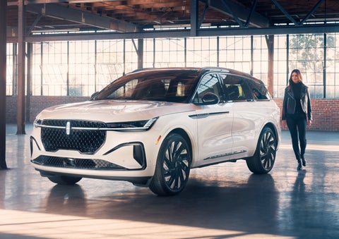 A person approaches a 2024 Lincoln Nautilus® SUV. | Fair Oaks Lincoln in Naperville IL