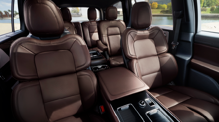 The cabin of the 2025 Lincoln Aviator® SUV is shown with black and brown accents. | Fair Oaks Lincoln in Naperville IL