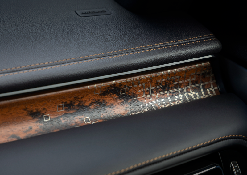 A close-up shot of the 2025 Lincoln Aviator® dashboard with unique black and brown accents, and brown stitching. | Fair Oaks Lincoln in Naperville IL