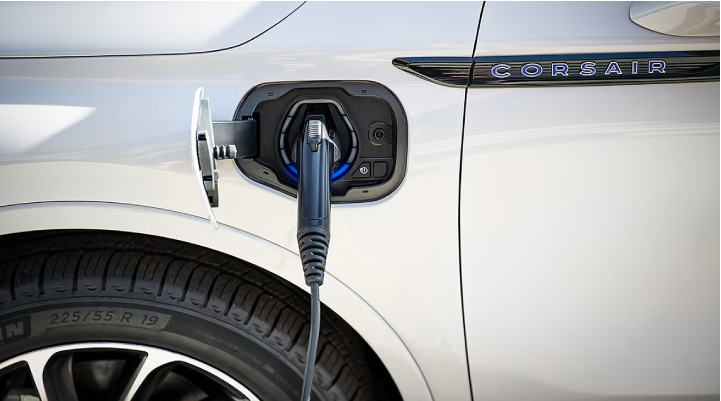 An electric charger is shown plugged into the charging port of a Lincoln Corsair® Grand Touring
model. | Fair Oaks Lincoln in Naperville IL