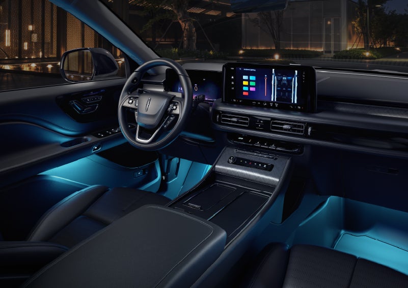 Deep blue ambient lighting glows from various places within a 2026 Lincoln Aviator® SUV. | Fair Oaks Lincoln in Naperville IL
