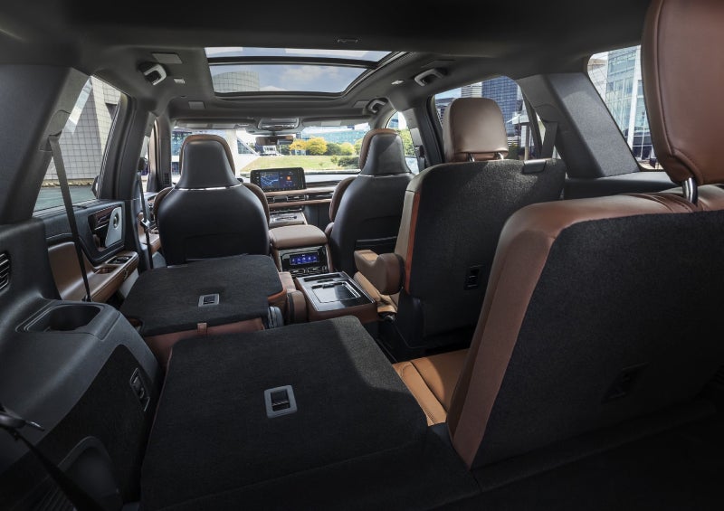 One side of the PowerFold® third-row seat and a second-row seat are folded forward in the 2026 Lincoln Aviator® SUV. | Fair Oaks Lincoln in Naperville IL