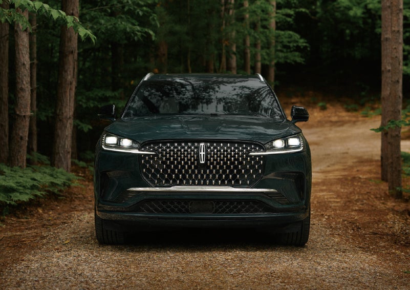 The front grille of a 2027 Lincoln Aviator® Black Label™ SUV is shown. | Fair Oaks Lincoln in Naperville IL